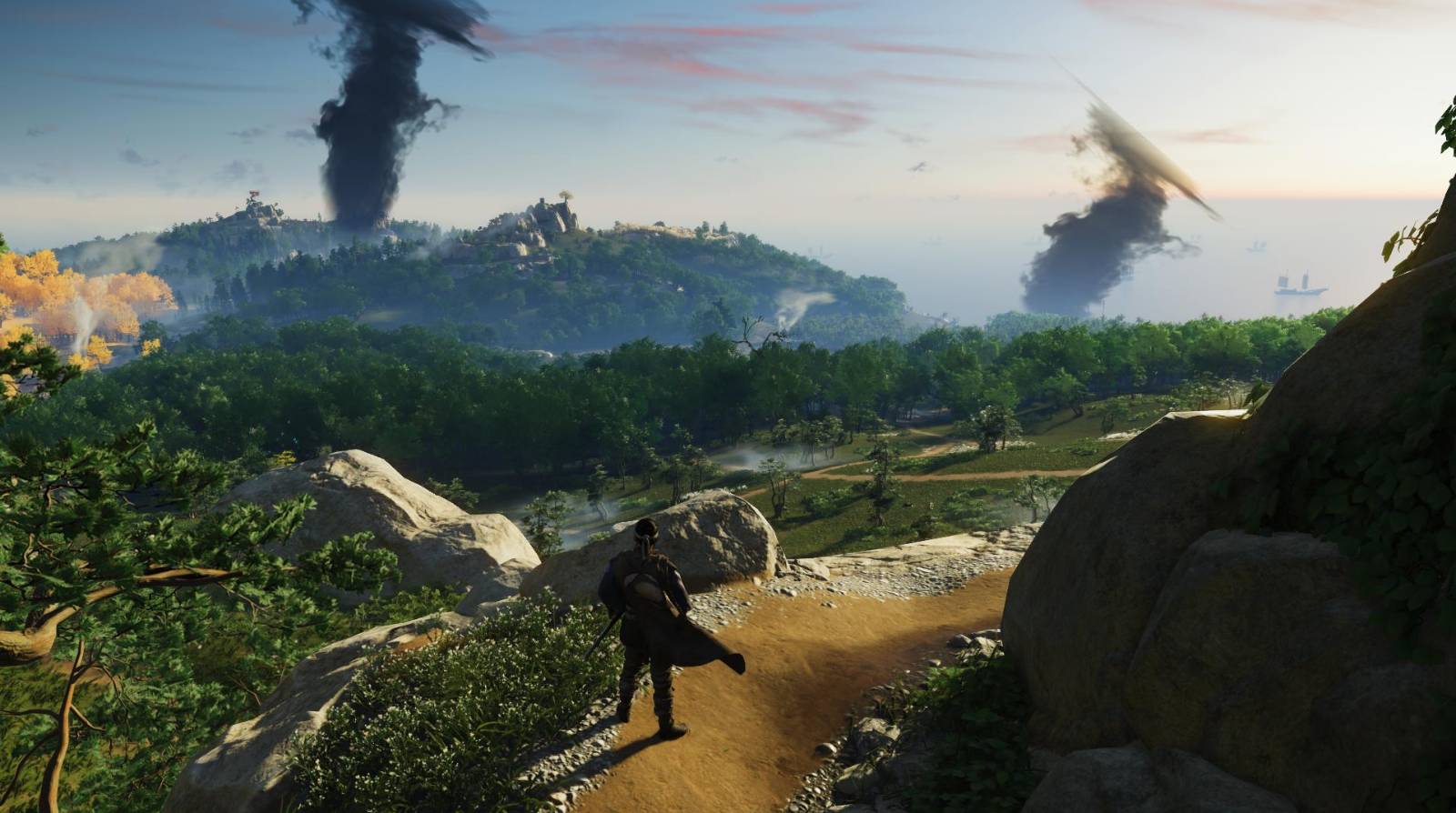 Character of Ghost of Tsushima looking at the scenic view of the open world.