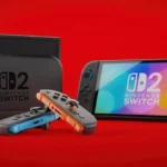 The Nintendo Switch 2 in the background, shown both in docked and handheld mode, with a pair of joycons in the front